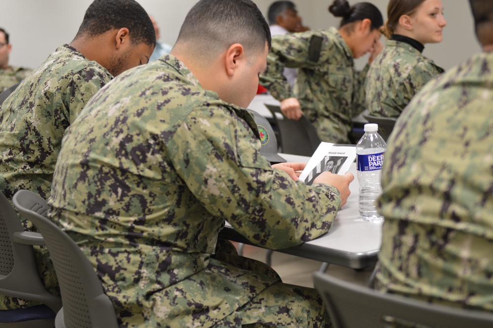 Naval Medical Readiness Logistics Command Sailors and Civilians receive a history presentation from Hampton Roads Naval Museum as part of African American History Month