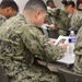 Naval Medical Readiness Logistics Command Sailors and Civilians receive a history presentation from Hampton Roads Naval Museum as part of African American History Month