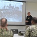 Naval Medical Readiness Logistics Command Sailors and Civilians receive a history presentation from Hampton Roads Naval Museum as part of African American History Month