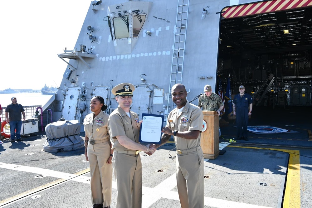 Navy Husband and Wife Promoted to Command Master Chief