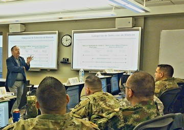 WHINSEC Honors Assistant Professor, retired Army Col. Carlos Rodriguez 45 Years of Federal Service.