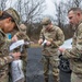 Staff Sgt. Daniel Kelly gives directions to Soldiers