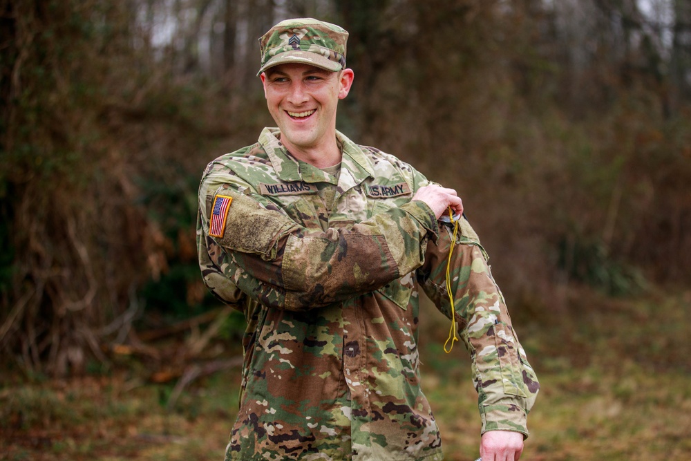 Sgt. Conner Williams finishes an orienteering exercise