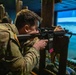 2nd Lt. Liam Spellissy fires a M4 simulation rifle