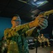 Sgt. Denzel Torres fires a M9 simulation pistol