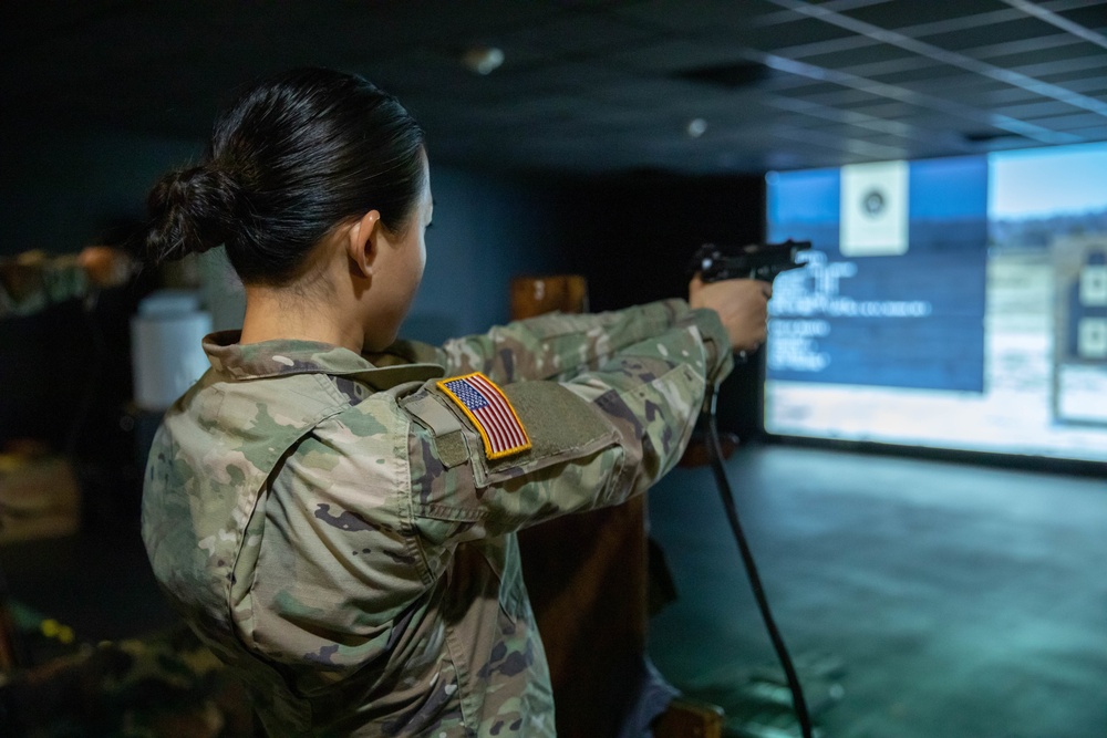 Sgt. Christine Won fires a M9 simulation pistol