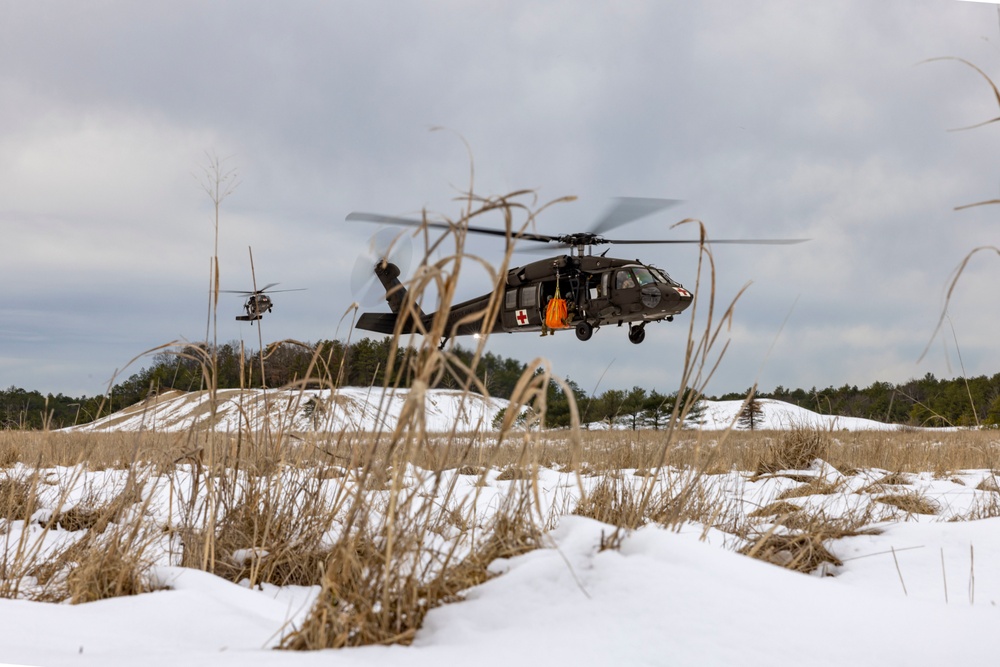 C Co, 1-126th Aviation Regiment MEDEVAC conduct hoist qualification training