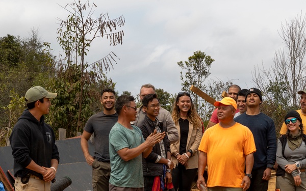 Recovery Team celebrate end of mission with local workers in Laos