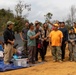 Recovery Team celebrate end of mission with local workers in Laos