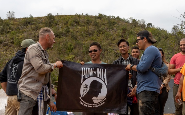 Recovery Team celebrate end of mission with local workers in Laos
