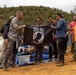 Recovery Team celebrate end of mission with local workers in Laos