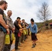 Recovery Team celebrate end of mission with local workers in Laos