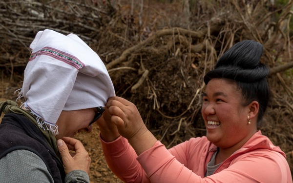 Recovery Team celebrate end of mission with local workers in Laos