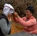 Recovery Team celebrate end of mission with local workers in Laos