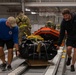 NASA alert crew, JB Charleston Airmen load rescue equipment onto C-17