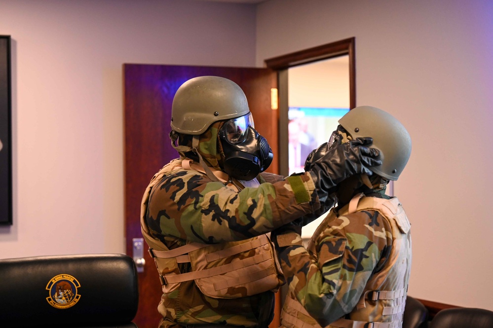 97 CS Airmen soak up readiness skills during MOPP exercise