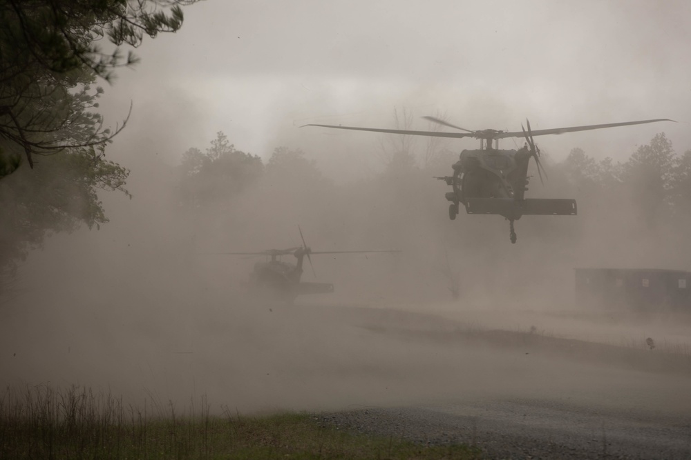 Soldiers with 2BCT of the 10th Mountain Division are moved by helicopter for JRTC