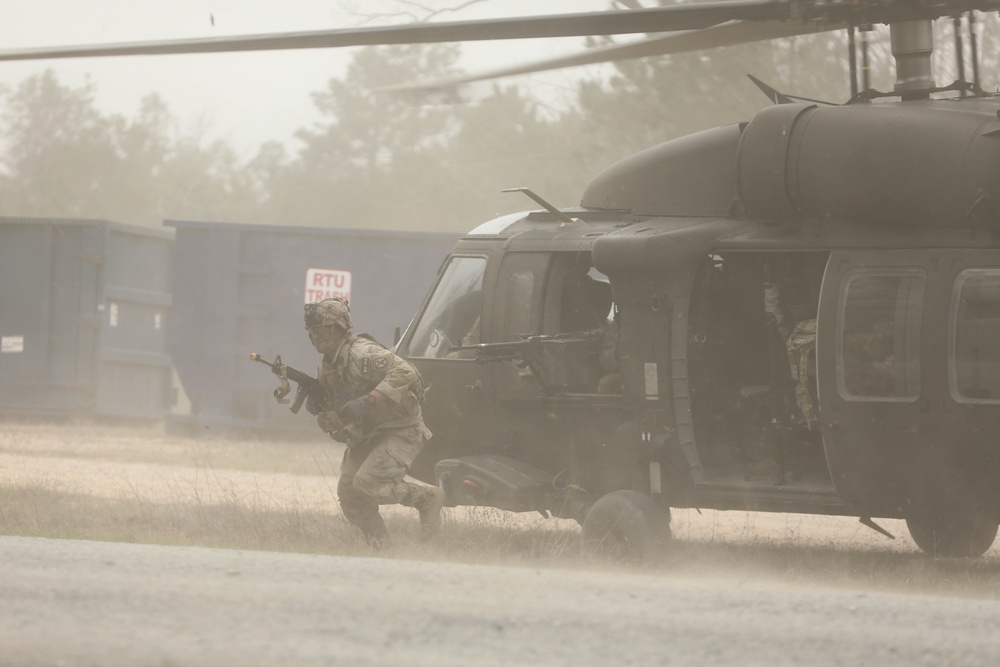 Soldiers with 2BCT of the 10th Mountain Division are moved by helicopter for JRTC