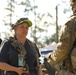 Soldiers with 2BCT of the 10th Mountain Division interact with role players serving as internally displaced people as part of the JRTC