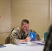 Soldiers with 2BCT of the 10th Mountain Division interact with role players serving as internally displaced people as part of the JRTC