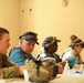 Soldiers with 2BCT of the 10th Mountain Division interact with role players serving as internally displaced people as part of the JRTC