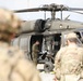 Soldiers with 2BCT of the 10th Mountain Division interact with role players serving as internally displaced people as part of the JRTC