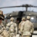 Soldiers with 2BCT of the 10th Mountain Division interact with role players serving as internally displaced people as part of the JRTC