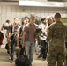 Soldiers with 2BCT of the 10th Mountain Division interact with role players serving as internally displaced people as part of the JRTC