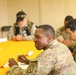 Soldiers with 2BCT of the 10th Mountain Division interact with role players serving as internally displaced people as part of the JRTC