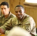 Soldiers with 2BCT of the 10th Mountain Division interact with role players serving as internally displaced people as part of the JRTC