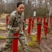 Sgt. Christine Won runs through an obstacle