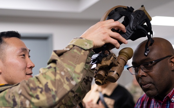PEO Soldier Assistant Product Manager Helps Member of ASA FM&amp;C Team Don ENVG-B
