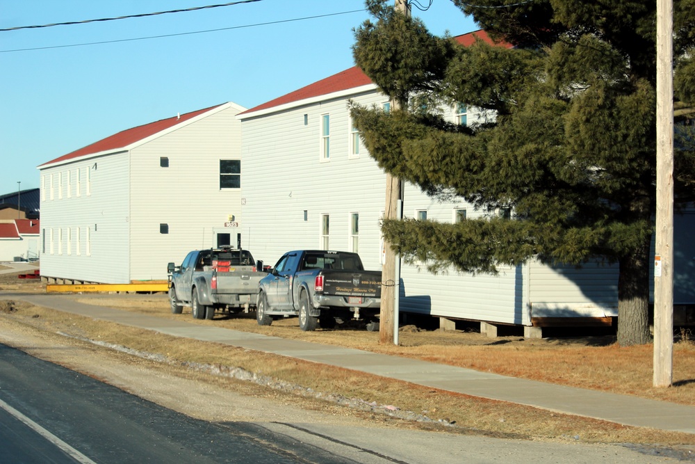 Contractors prepare World War II-era barracks buildings to be moved at Fort McCoy