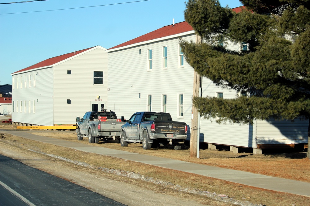 Contractors prepare World War II-era barracks buildings to be moved at Fort McCoy