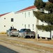 Contractors prepare World War II-era barracks buildings to be moved at Fort McCoy