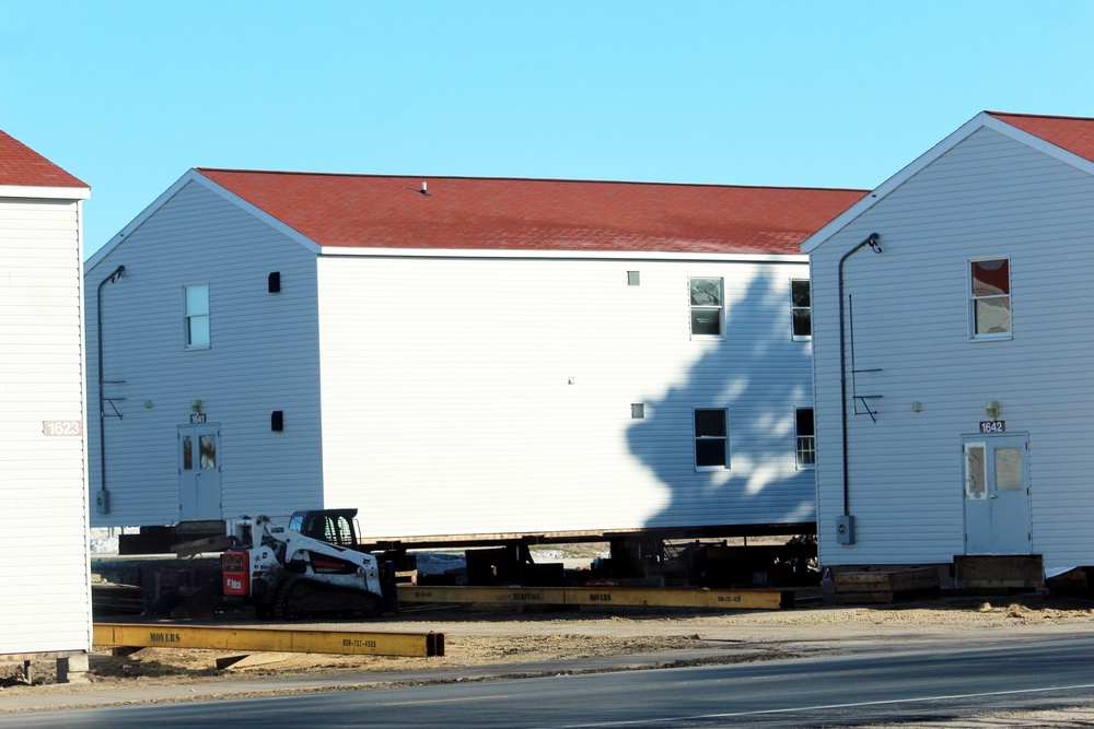 Contractors prepare World War II-era barracks buildings to be moved at Fort McCoy