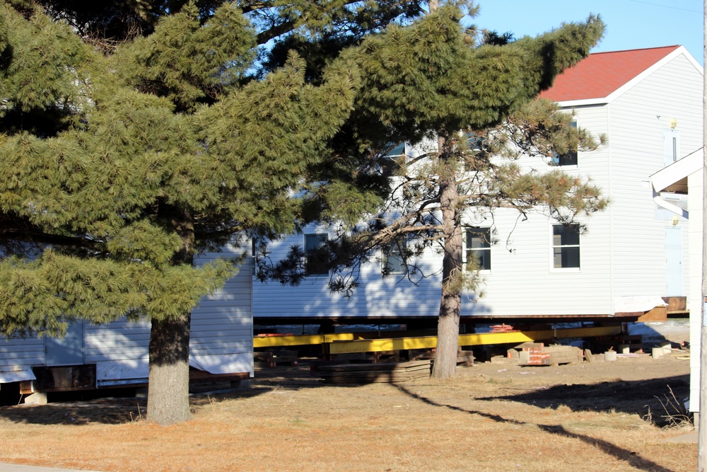 Contractors prepare World War II-era barracks buildings to be moved at Fort McCoy