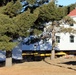 Contractors prepare World War II-era barracks buildings to be moved at Fort McCoy