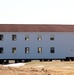 Contractors prepare World War II-era barracks buildings to be moved at Fort McCoy
