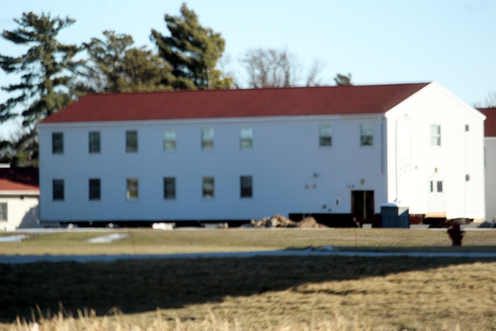 Contractors prepare World War II-era barracks buildings to be moved at Fort McCoy