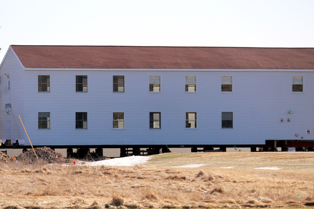 Contractors prepare World War II-era barracks buildings to be moved at Fort McCoy