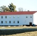 Contractors prepare World War II-era barracks buildings to be moved at Fort McCoy