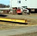 Contractors prepare World War II-era barracks buildings to be moved at Fort McCoy