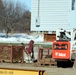 Contractors prepare World War II-era barracks buildings to be moved at Fort McCoy