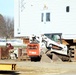 Contractors prepare World War II-era barracks buildings to be moved at Fort McCoy