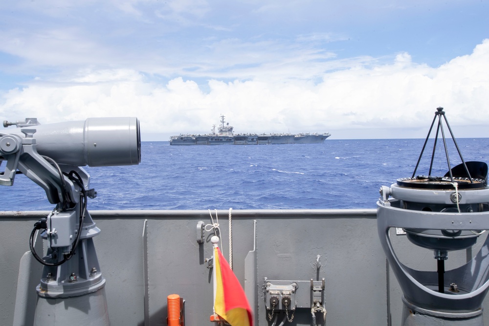 USS Nimitz Steams Alongside JS Asagiri