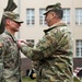 Maj. Gen. Womack Awards Outgoing CA Team