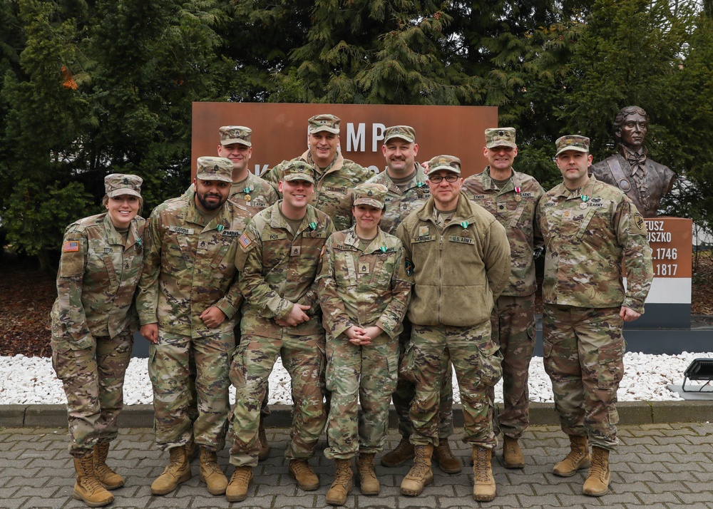 Maj. Gen. Womack Awards Outgoing CA Team