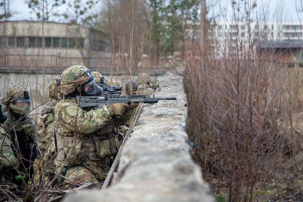 eFP Battle Group Poland Train to Fight in Urban Battlefield