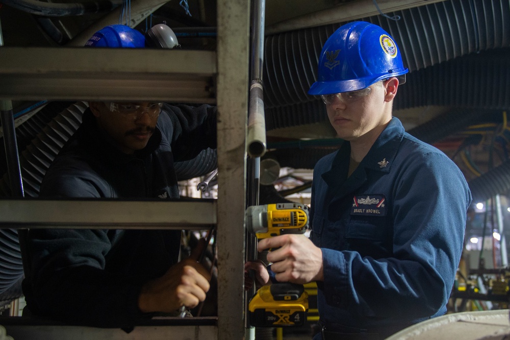 Sailors repair equipment